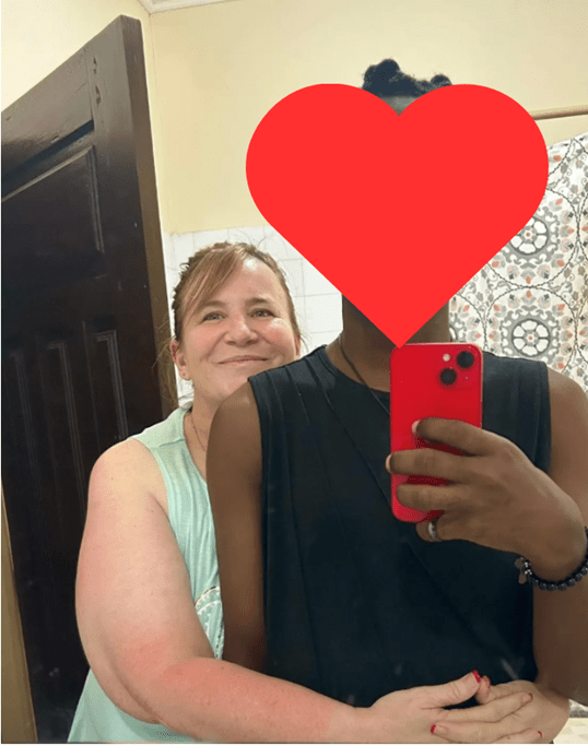 Mindy Wilson hugs one of the foster siblings provides care for sibling groups to